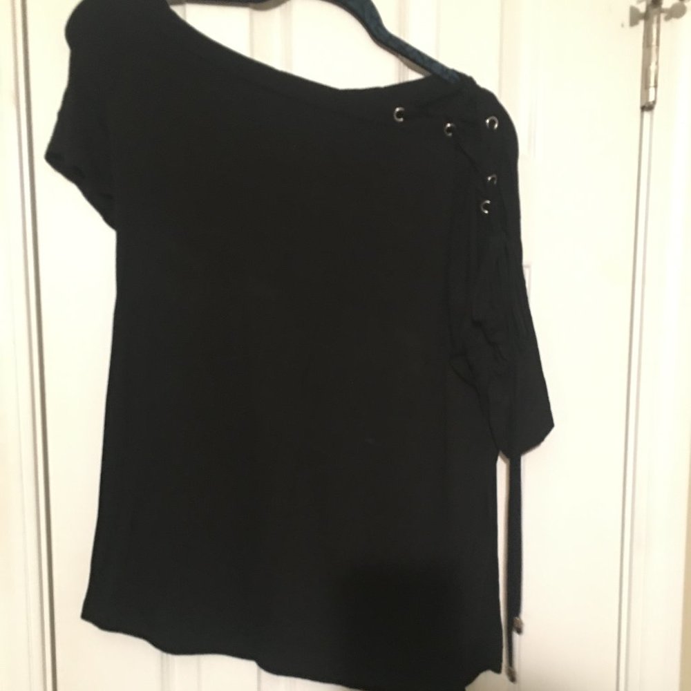 Blouse with shoe lace tie on the shoulder